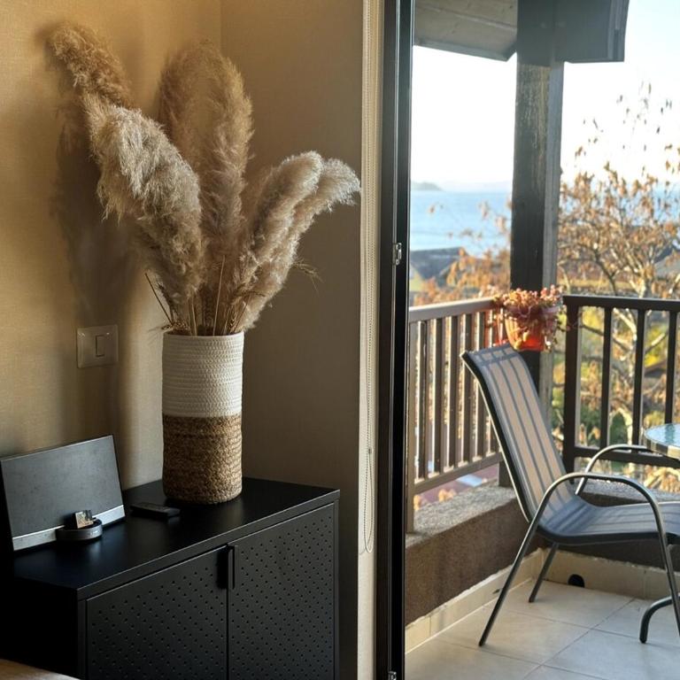 Terraza con vista al lago - Último piso - Two-Bedroom Apartment - 41