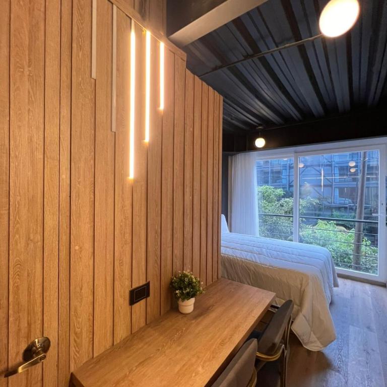 Elegant 1-Bedroom Apartment with Coworking Space - Apartamento de 1 dormitorio - 7