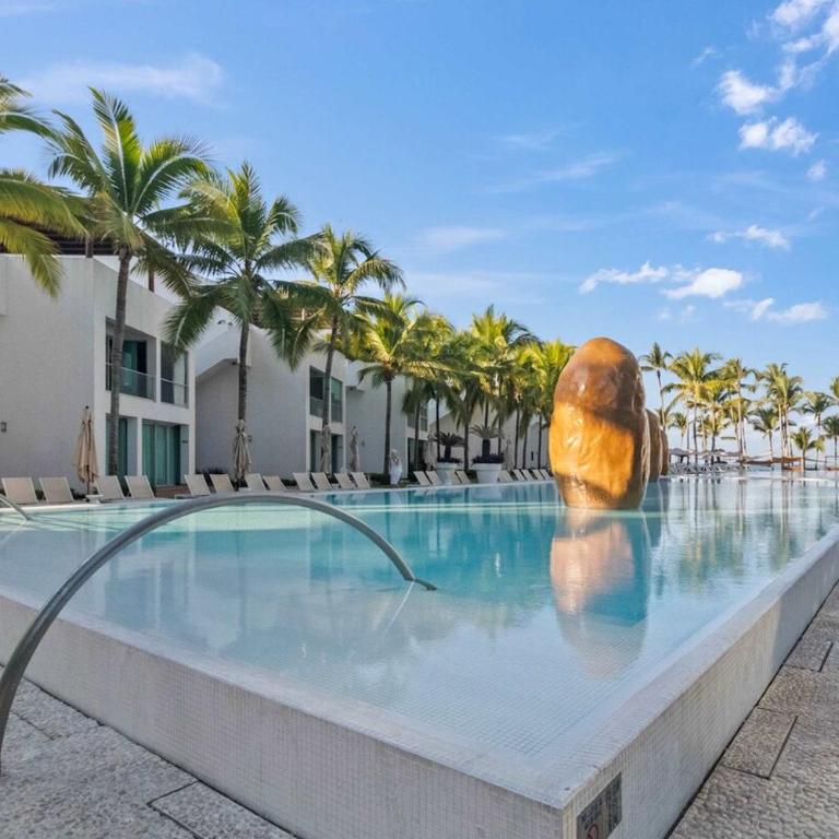 Oceanview 3BR Apt with Beach Access - Pools - Gym - Casa - 46