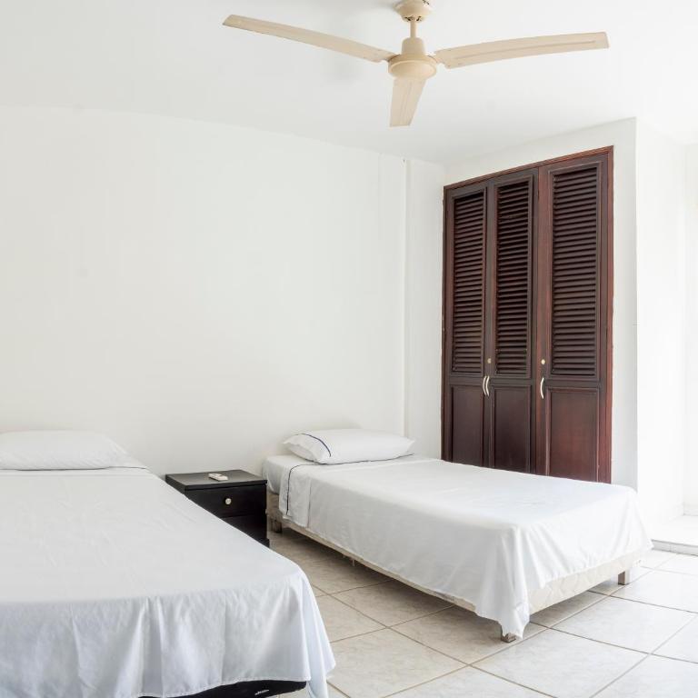 Casa en conjunto cerrado, frente al mar - Three-Bedroom House - 6