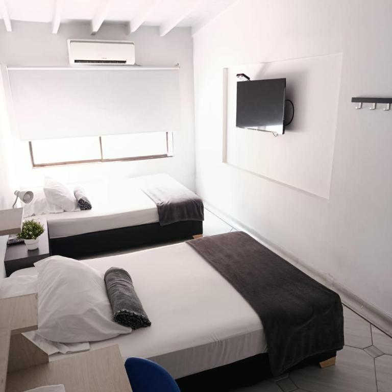La Carpita Hotel - Habitación Cuádruple con baño privado - 1