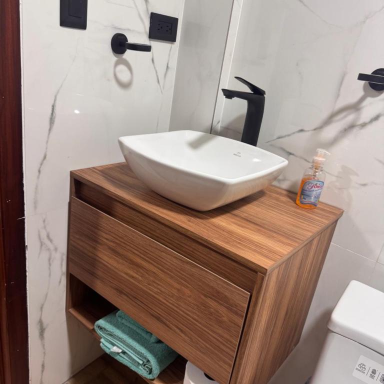 Suite ejecutiva con Parqueo Privado - One-Bedroom Apartment - 15