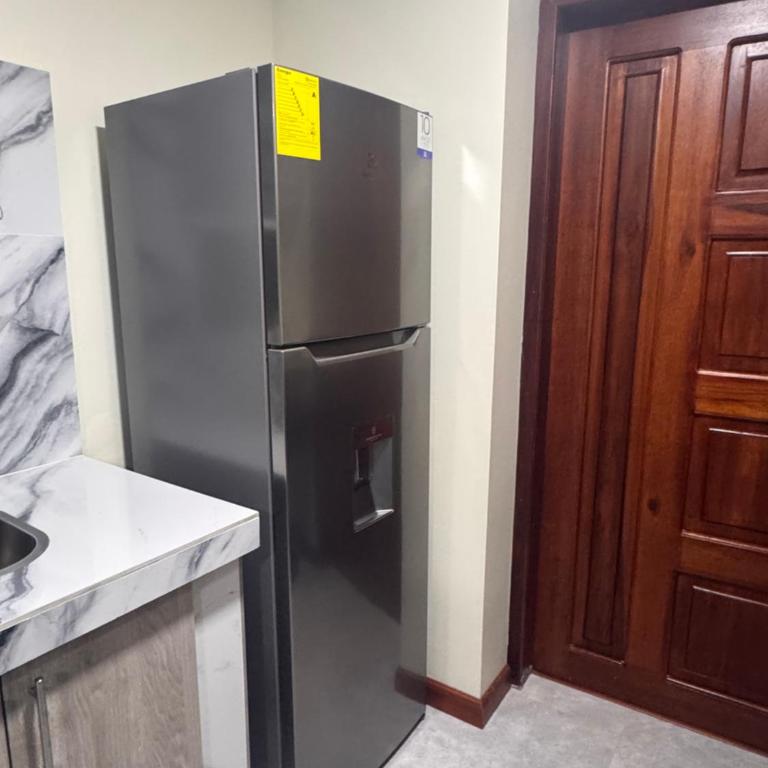 Suite ejecutiva con Parqueo Privado - One-Bedroom Apartment - 13