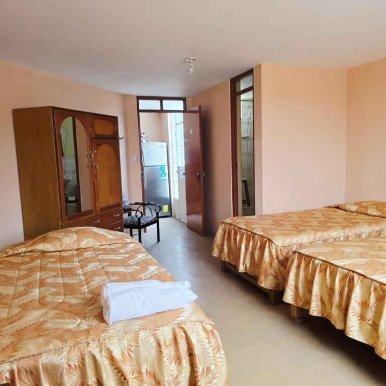 Casa Hospedaje Familiar Yasmin - Quadruple Room with Private Bathroom - 1