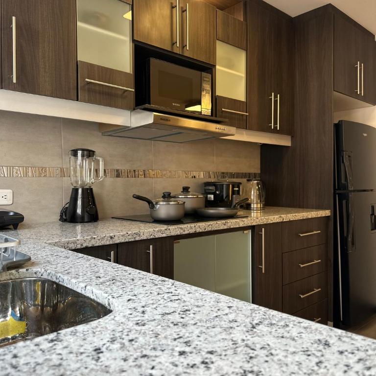 Quicentro Guest home By Carlos David - Two-Bedroom Apartment - 7