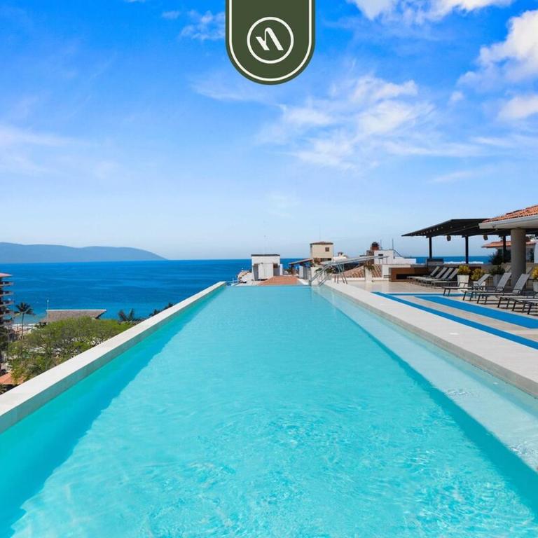 Elegant 2 BR Condo with Amazing Rooftop Pool - Casa - 10