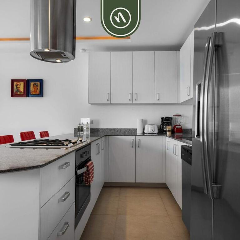 Elegant 2 BR Condo with Amazing Rooftop Pool - Casa - 19