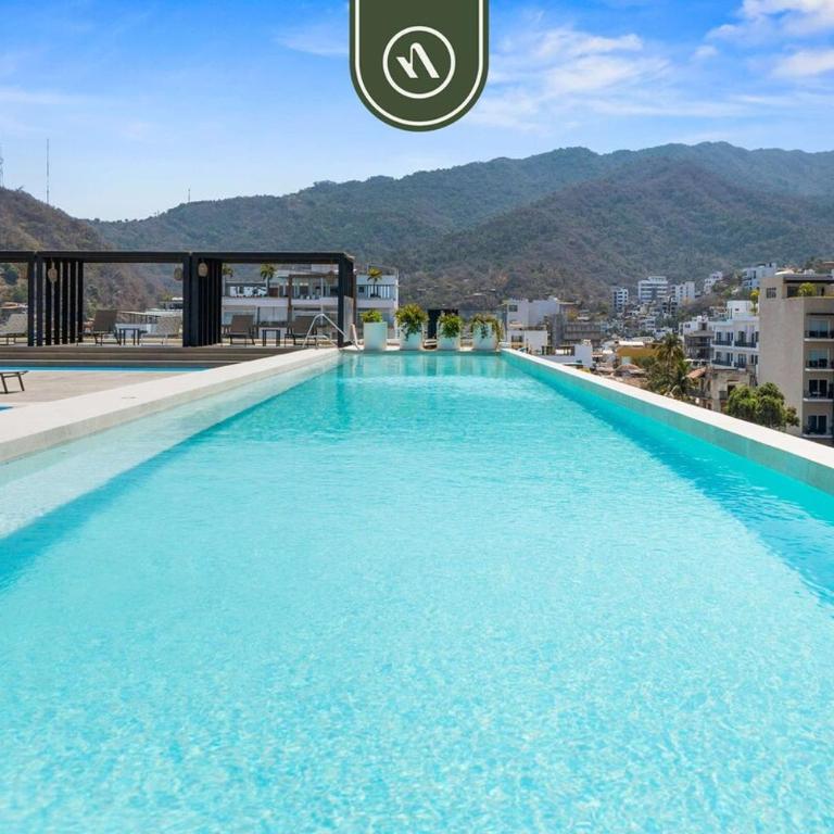 Elegant 2 BR Condo with Amazing Rooftop Pool - Casa - 33