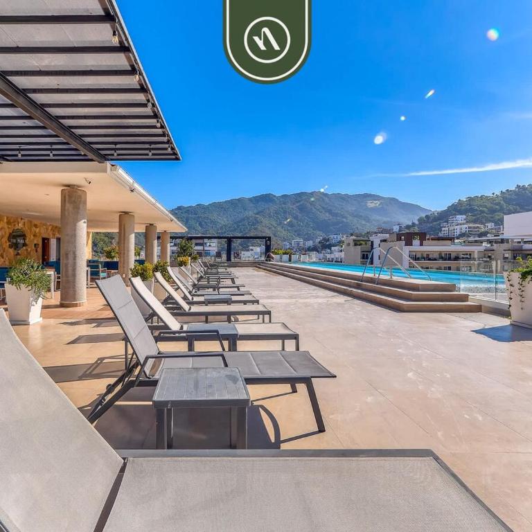 Elegant 2 BR Condo with Amazing Rooftop Pool - Casa - 36