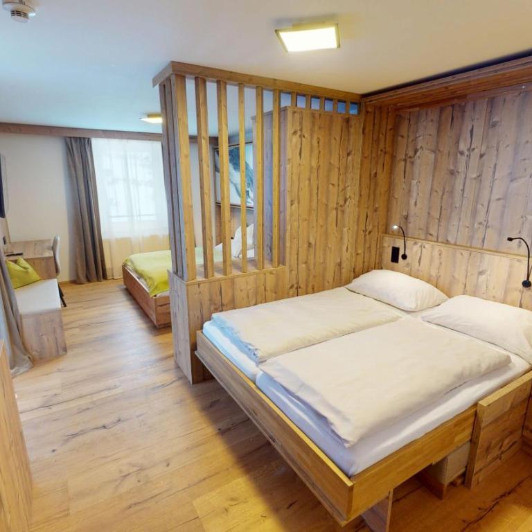 Smarthotel inAlpe - Deluxe Zimmer mit 2 Queensize-Betten - 3
