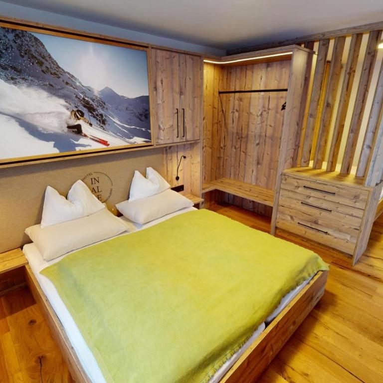 Smarthotel inAlpe - Deluxe Zimmer mit 2 Queensize-Betten - 4
