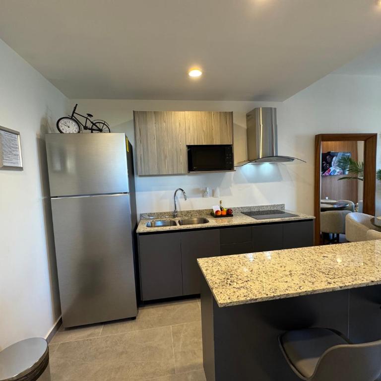 Departamento en Mazatlán en Zona Dorada cerca de la Playa pública Alberca climatizada 2 hab - Two-Bedroom Apartment with Balcony - 7