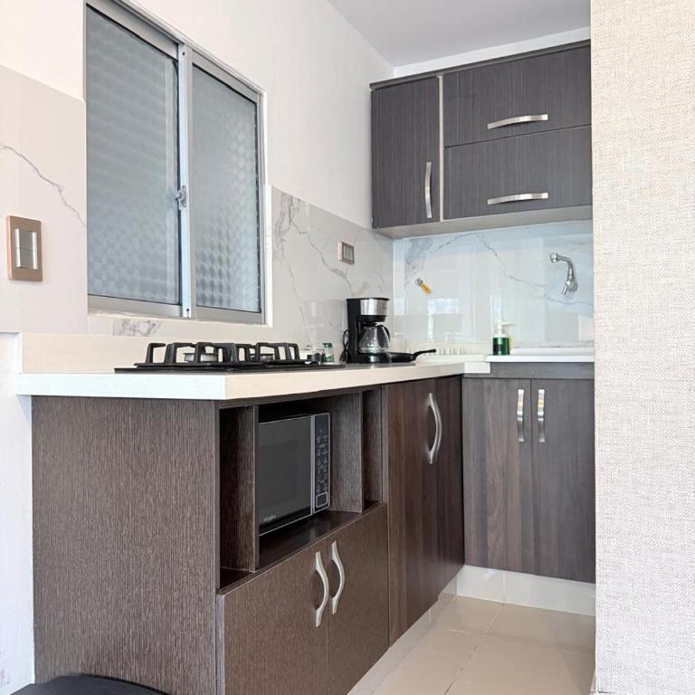 Apartaestudio en Laureles-plaza mayor-Av 33-laundry-wifi - Studio - 4