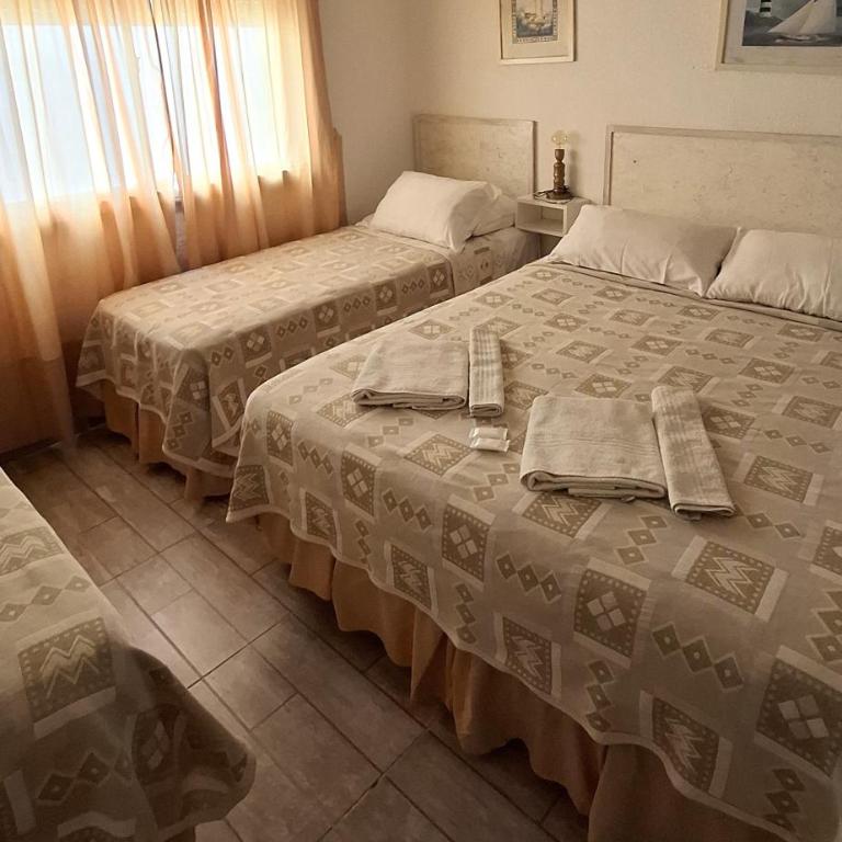 Hotel 9 de Diciembre - Habitación Cuádruple Prémium - 5