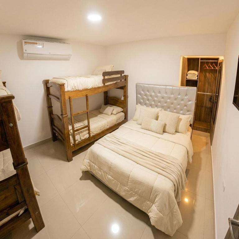 Apartaestudios Galanni - Habitación Cuádruple Estándar - 12