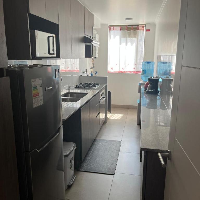 Hermoso departamento - Three-Bedroom Apartment - 11