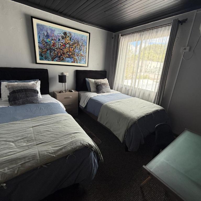 Hostal Suomi - Habitación Doble con baño privado - 2 camas - 1