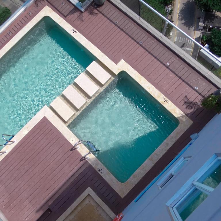 Apto chic con AC 3 hab 2 baños cerca al Mar - Three-Bedroom Apartment - 21