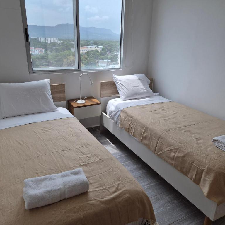 Hermoso apartamento familiar en Ricaurte - Three-Bedroom Apartment with Balcony - 11