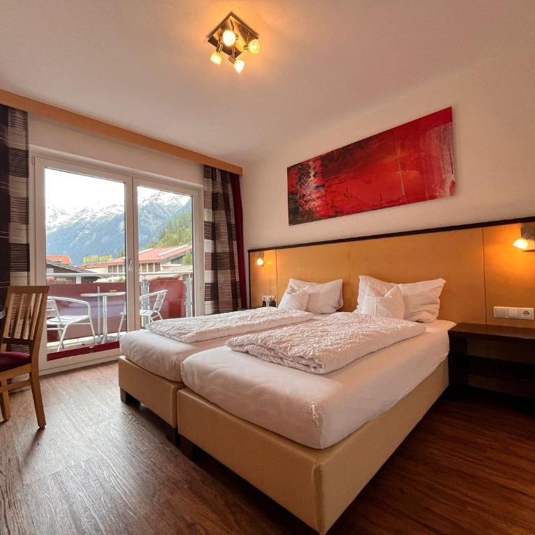 Sporthotel Bergheim - Vierbettzimmer mit Balkon - 2