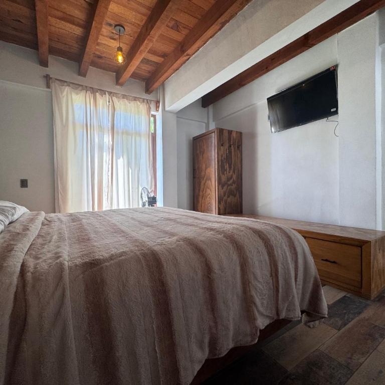 Glamping en Valle de Bravo - Habitación Deluxe - 1 cama grande - 2