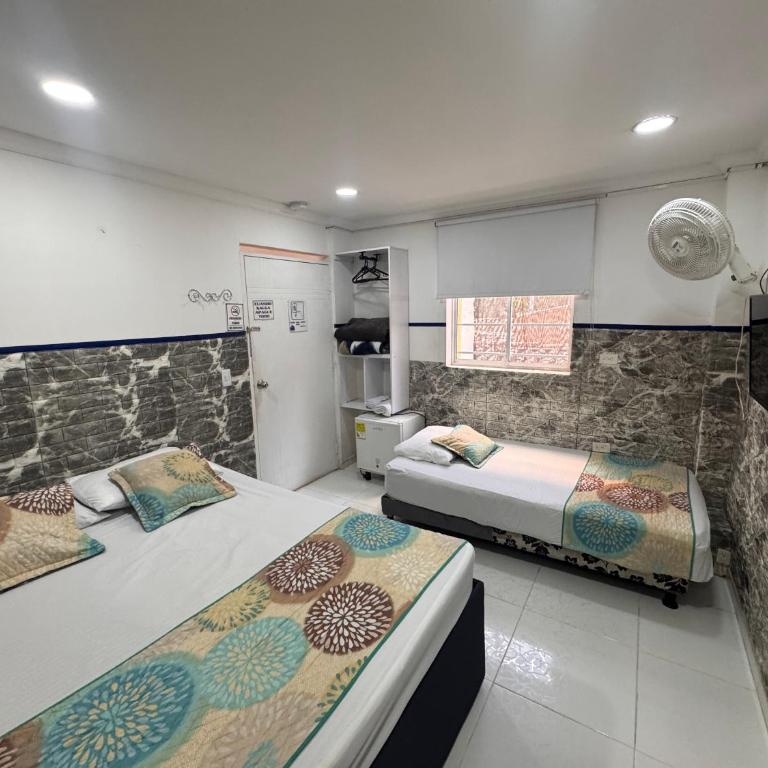 Casa Hotel Manco Mora - Habitación Doble Familiar - 3