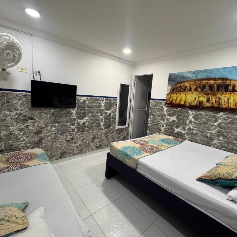 Casa Hotel Manco Mora - Habitación Doble Familiar - 6