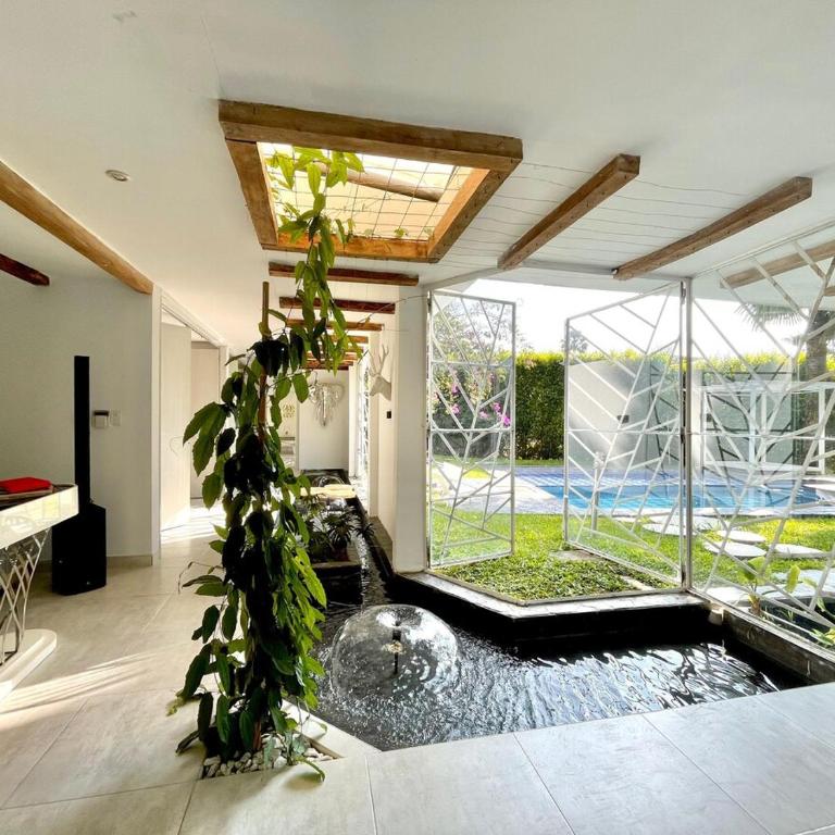 Casa con piscina privada Tebaida Quindío Parque del Café - Three-Bedroom House - 29