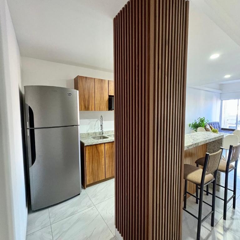 DEPA NUEVO en TORRE CORDOBA a pasos del MALECON y PLAYA - Three-Bedroom Apartment - 7