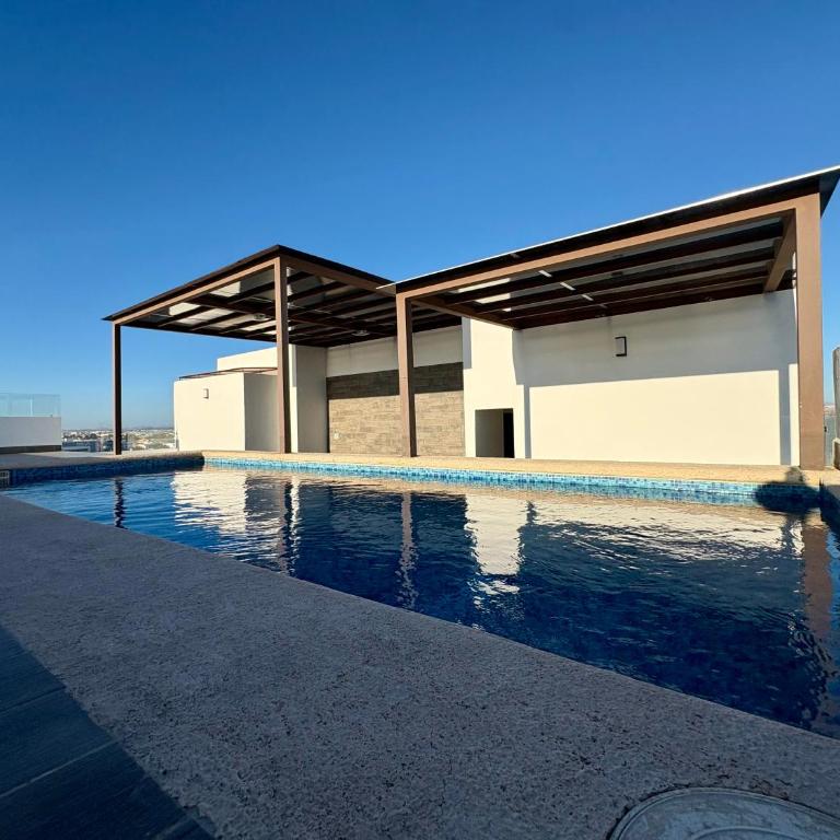 DEPA NUEVO en TORRE CORDOBA a pasos del MALECON y PLAYA - Three-Bedroom Apartment - 1