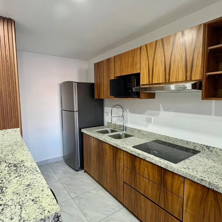 DEPA NUEVO en TORRE CORDOBA a pasos del MALECON y PLAYA - Three-Bedroom Apartment - 9