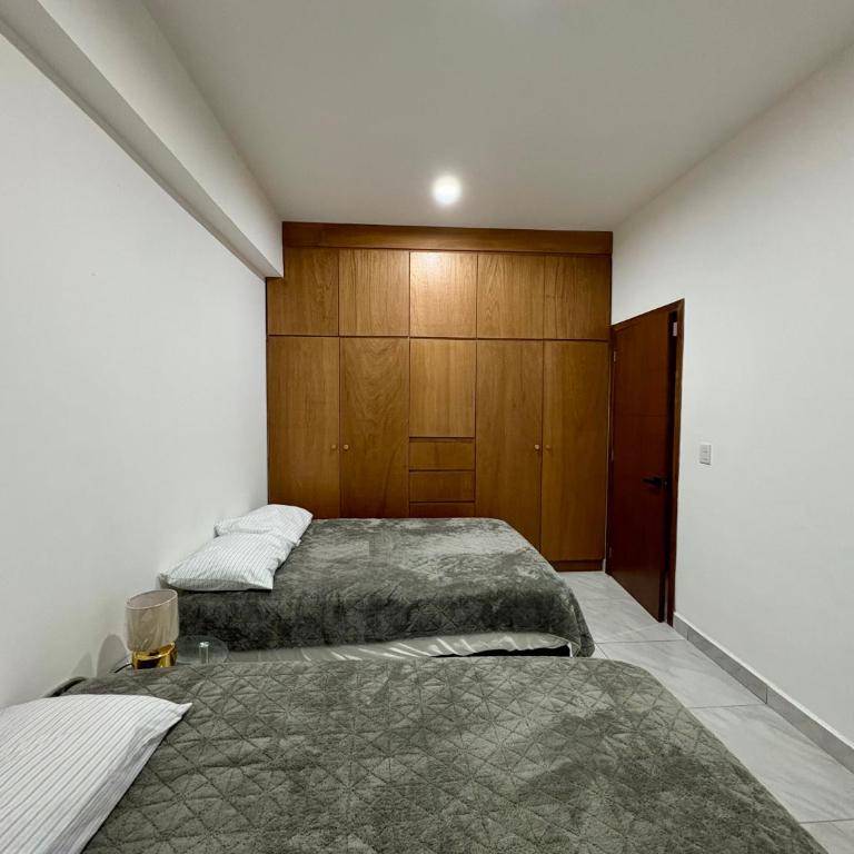 DEPA NUEVO en TORRE CORDOBA a pasos del MALECON y PLAYA - Three-Bedroom Apartment - 22