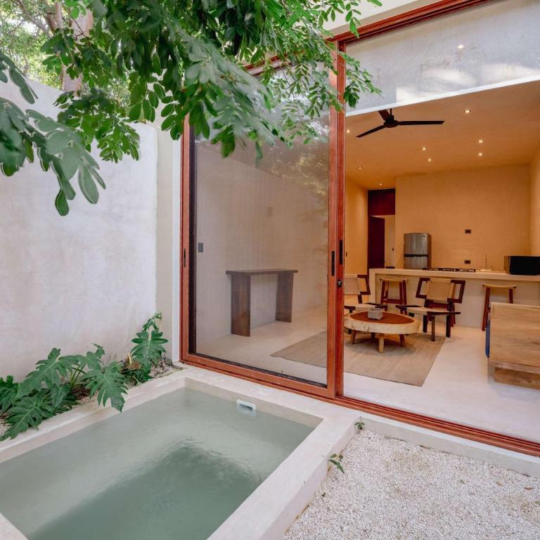 Stylish 1BR Retreat in Holistika with Private Pool - Apartamento - 5