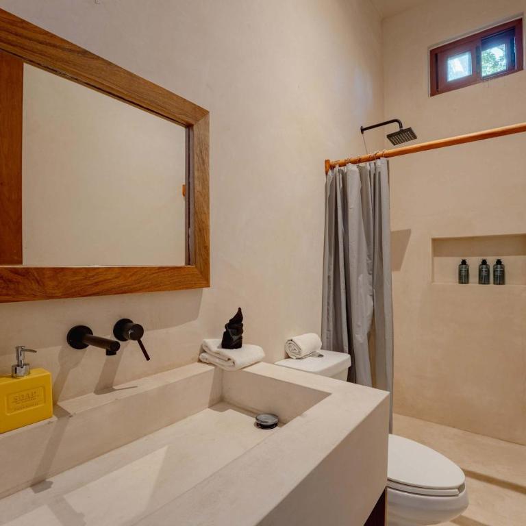 Luxury 2BR Retreat with Private Rooftop - Holistika - Apartamento - 11