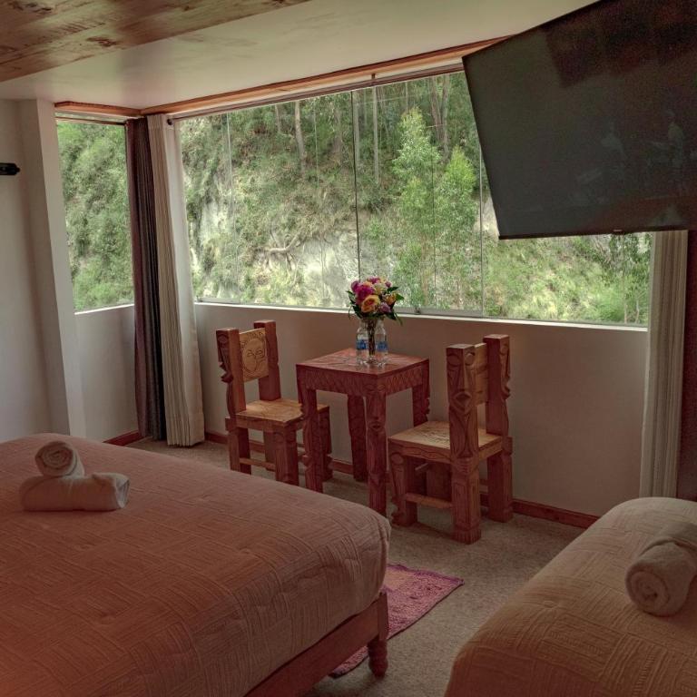CASA SAPANTIANA, cerca a Sacsayhuaman - Habitación con cama extragrande y vistas a la montaña - 12