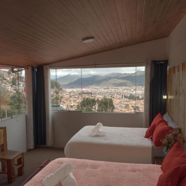 CASA SAPANTIANA, cerca a Sacsayhuaman - Habitación Doble Estándar con vistas a la montaña - 2 camas - 4