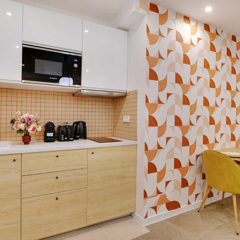 Appartement Cosy Faubourg Saint-Denis 4P - Apartamento - 14