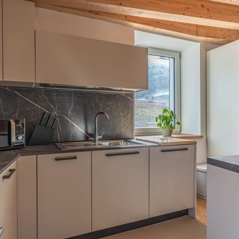 Duplex Cermis - Appartamentino su 2 Livelli - 38