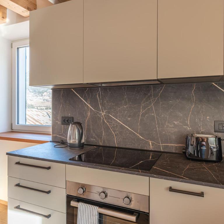 Duplex Cermis - Appartamentino su 2 Livelli - 47