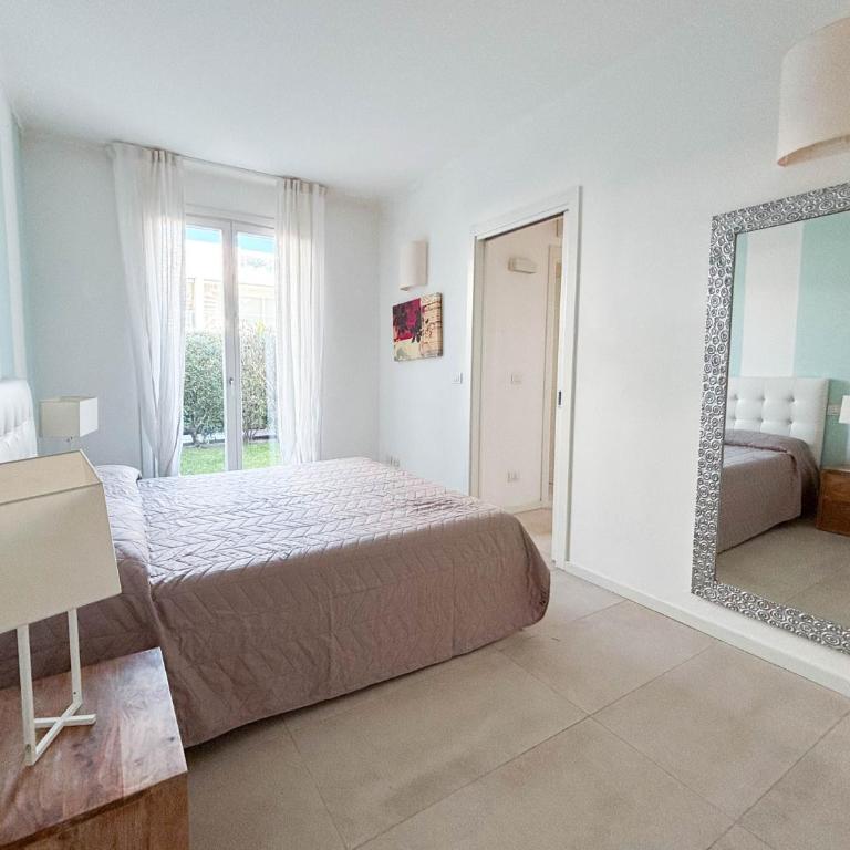 Villaggio Dei Pellicani - Appartamento con 2 Camere da Letto e Vista Piscina - 10