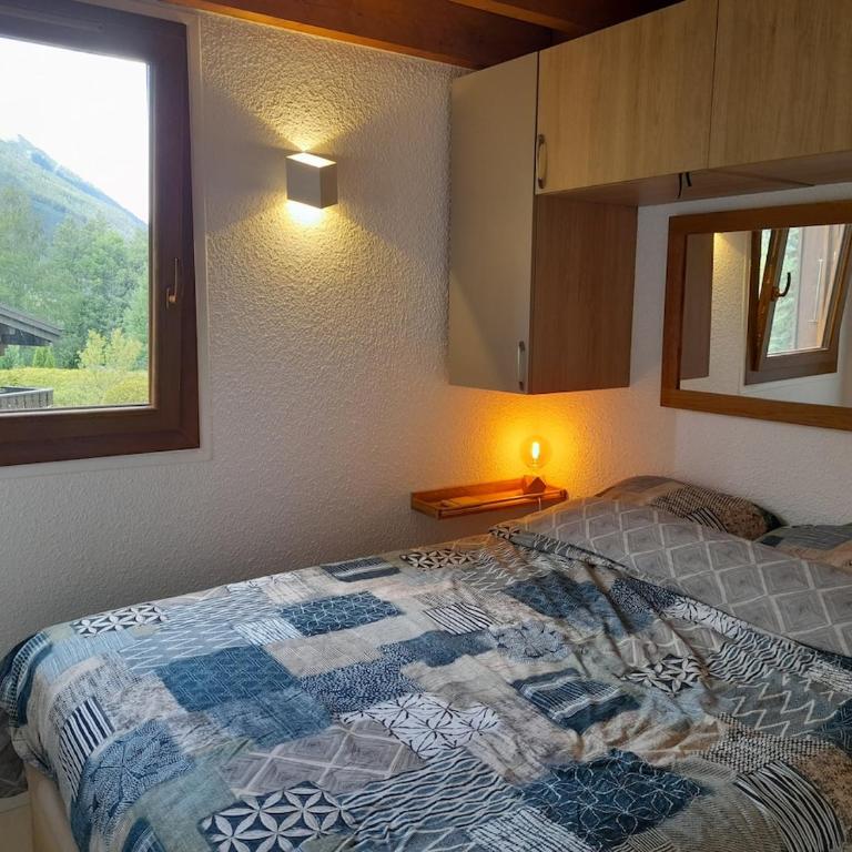 Chalet mitoyen au calme - rez-de-jardin - parking - Appartement 2 Chambres - 6