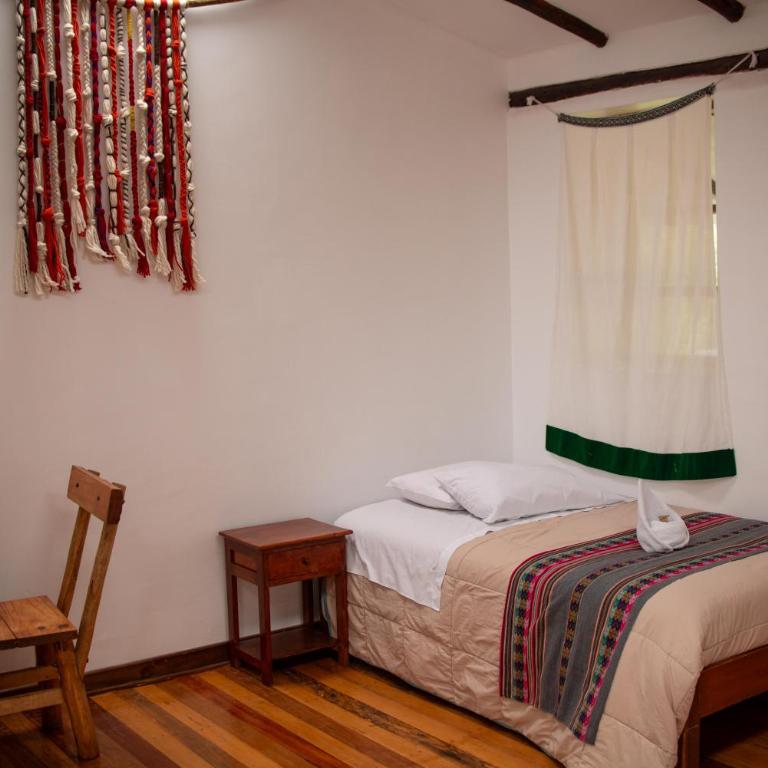 Casita Huaran - Habitación Cuádruple - vistas al jardín - 15