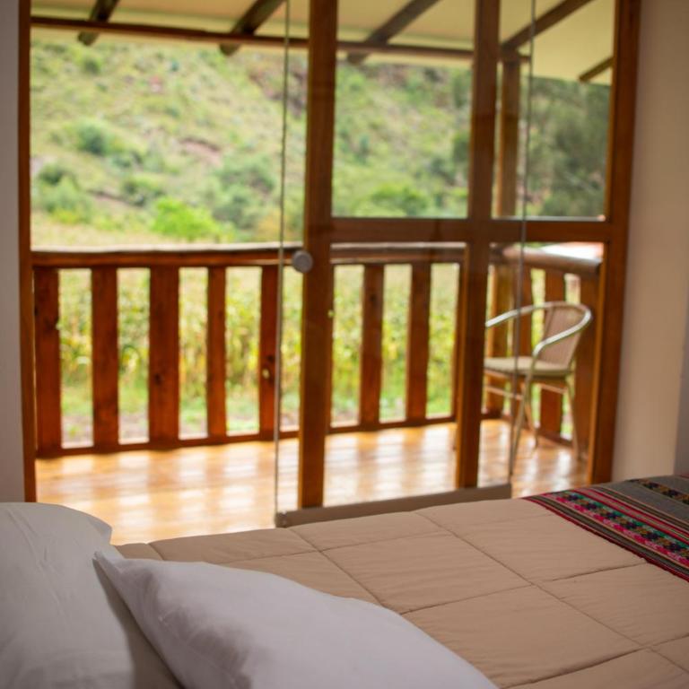 Casita Huaran - Habitación Cuádruple - vistas al jardín - 3