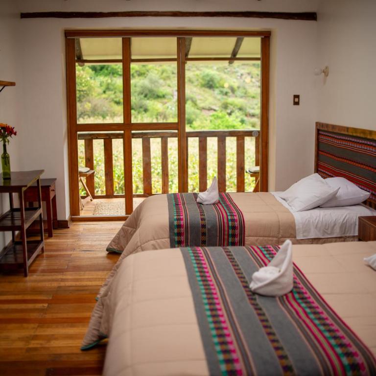Casita Huaran - Habitación Cuádruple - vistas al jardín - 8