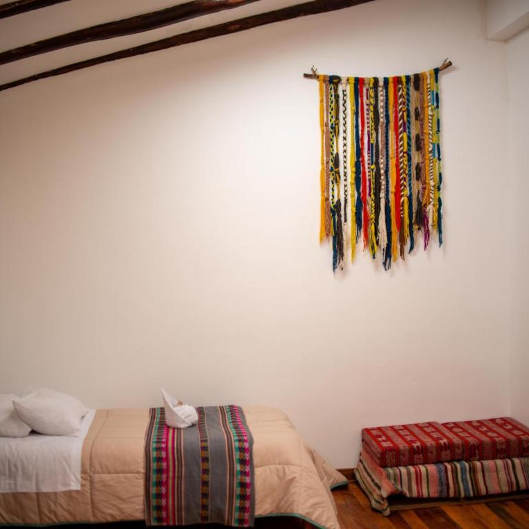 Casita Huaran - Habitación Cuádruple - vistas al jardín - 10