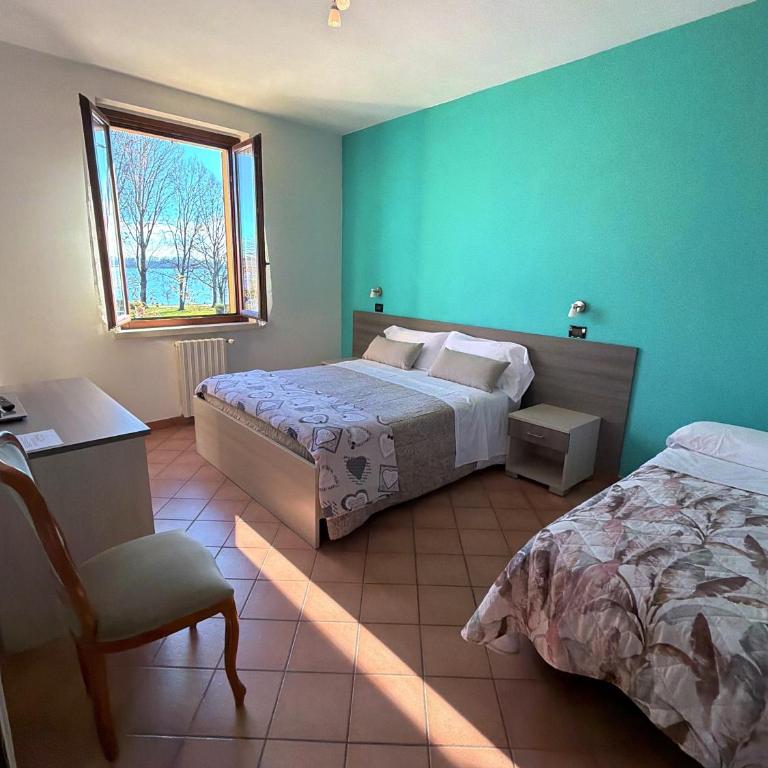 Residenza Bibiena - Lake View - - Camera Tripla con Vista Lago - 11