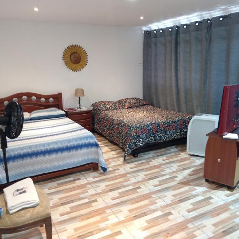Casa Turistica Andy - Habitación Cuádruple Económica con baño compartido - 5