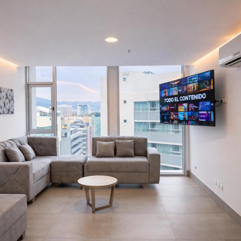 3 camas, vista panoramica, frente a Mall del Sol - Suite with City View - 1