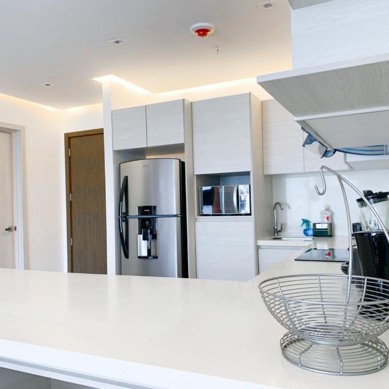 3 camas, vista panoramica, frente a Mall del Sol - Suite with City View - 9