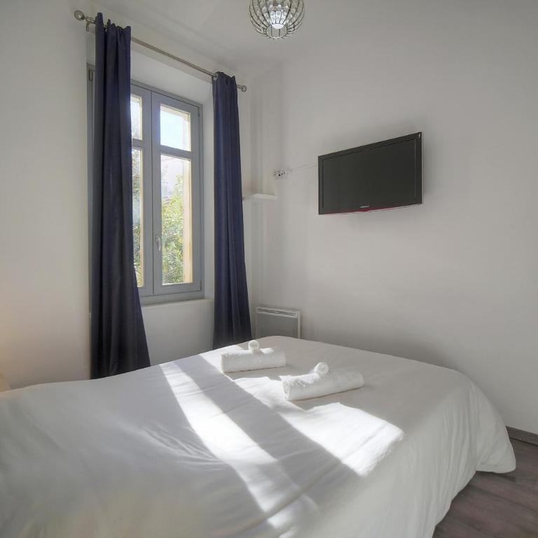 FRGK Goujon 1BR Design 300m Palais & Beaches AC & Ultra-Fast Wi-Fi - Appartement 1 Chambre de Luxe - Vue sur Jardin - 10